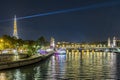 Parisian Life at Night Eiffel Tower Seine River and Boats Traffic Bridge