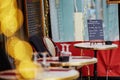 Parisian outdoor cafe with menu board on the table Royalty Free Stock Photo