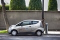 Parisian owner recharges batteries of your electric car at charging station