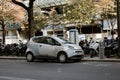 Parisian owner recharges batteries of your electric car at charging station