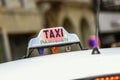 Parisian taxi on avenue des champs-elysees