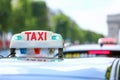 Parisian taxi in the city