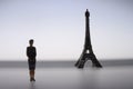 Parisian woman in front of Eiffel tower Royalty Free Stock Photo