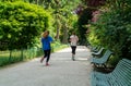Parisians jogging in the Parc Monceau - Paris, France