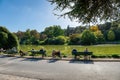 Parisians sunbathing on the shore of the lake of Parc Montsouris - Paris, France