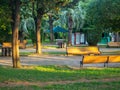 Park area with benches. Small business at the resort in the park. Place for rest Royalty Free Stock Photo