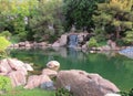 Park in Arizona with a Koi pond with a waterfall Royalty Free Stock Photo