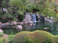 Park in Arizona with a Koi pond with a waterfall Royalty Free Stock Photo