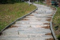 Park: avenue with stone steps in the shape of a double curve.