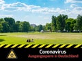 Park banner curfew in Germany corona virus in german background