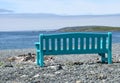 Park bench at the beach overlooking the coastline