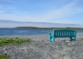 Park bench at the beach overlooking the coastline