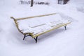 Bench covered with snow at winter morning. background, nature.