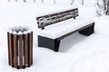 park bench covered with snow in winter Royalty Free Stock Photo