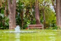 Park bench with fountain Royalty Free Stock Photo