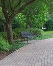 Park Bench and Pavestone Walkway Royalty Free Stock Photo