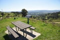 A Park bench picnic area at Huon Hill lookout above the Murray and Kiewa floodplains, offers spectacular views of Lake Hume.