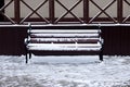 Park bench in retro style under the snow Royalty Free Stock Photo