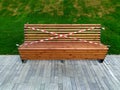 Park bench rewound with tape due to Covid-19 Royalty Free Stock Photo