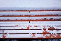 Park bench in snow winter background Royalty Free Stock Photo