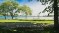 Park bench and view to lake Krakower See Royalty Free Stock Photo