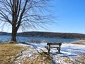 Park bench lake view in winter on Otisco Lake Royalty Free Stock Photo