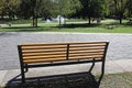 Park bench in the woods autumn time Royalty Free Stock Photo