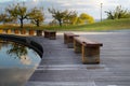 park benches around a small pond