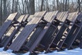 Park benches waiting for Spring