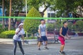 Park in the center of Ho Chi Minh City, morning exercises of Vietnamese residents, playing bambinton