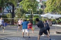 Park in the center of Ho Chi Minh City, morning exercises of Vietnamese residents, playing bambinton