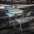 Park Chairs and Round Table in Bosque Park in Addison TX Royalty Free Stock Photo