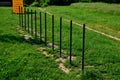 Park for dogs. training ground for dogs. Tunnels and beams, obstacle courses of metal and plastic. design new playground for dog o Royalty Free Stock Photo