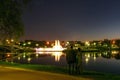 Park fountain pond bridge night lights reflection moscow Royalty Free Stock Photo