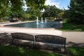 Park Fountains with Facing Benches Royalty Free Stock Photo