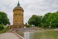 The park at Friedrichsplatz with water tower in Mannheim. Royalty Free Stock Photo