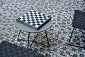 Park furniture chess table and chairs for four persons made of Royalty Free Stock Photo