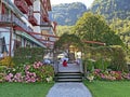A park with a garden and green areas next to the Grand Hotel Giessbach above Lake Brienz Brienzersee - Canton of Bern