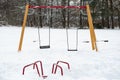 Park kids and children playground for game and activities empty and covered by the snow