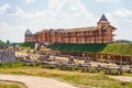 Park Kievan Rus, Kyiv region, Ukraine. July 06, 2013. Wooden fortifications with towers on the earthen rampart. Medieval