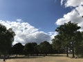 Park Landscape with Big Trees and Blue Skies with Clouds Royalty Free Stock Photo