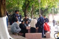 Park landscape, the men and women and the young and the young tourists play in the park