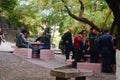 Park landscape, the men and women and the young and the young tourists play in the park