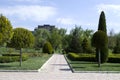 Park with a long road along the trees. The curve the path of concrete tiles on a Sunny day.Park with a long road along the trees.P Royalty Free Stock Photo