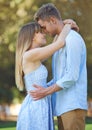 Park, love and relax couple hug for outdoor romance, wellness and anniversary date in nature. Embrace, commitment and