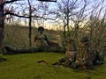 Park of the Monsters, Sacred Grove, Garden of Bomarzo. Lion and lioness rest with a siren