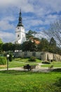 The park near the Church of the Nativity of the Virgin Mary in Nove Mesto nad Vahom town Royalty Free Stock Photo