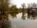 Park `Peremoga` view with a lake in springtime. Kiev, Ukraine. Royalty Free Stock Photo