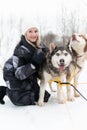 park pet young outdoor snow dog person girl animal husky season friendship winter adult woman