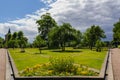 The park Pildammsparken looks lush with green trees, green fields and sunflowers in full bloom on a summer day in MalmÃÂ¶, Sweden Royalty Free Stock Photo